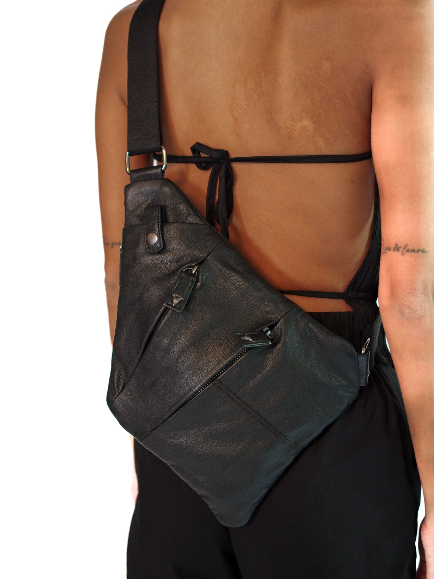 Kin, Pochette en Cuir